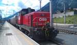 BB 2068 009 steht am 16.07.2012 mit einem gemischten Gterzug kalt im Bahnhof Jenbach. 