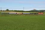 2143 009 mit Sonderzug 14676 von Wien Fjb ber Tulln nach Ernstbrunn, fotografisch festgehalten, am 06.05.2012 kurz nach Stetten. Im Hintergrund ist brigens Burg Kreuzenstein zu sehen.