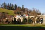 Ein Triebwagen der Rh 5022 berquert am 25.11.2012 als REX/R2711 (Wiener Neustadt Hbf- Fehring) das Murtalbachviadukt bei Aspang.
