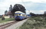 Im Juni 1987 hat 5046 210-0 auf seiner Fahrt von Oberpullendorf nach Wiener Neustadt den Bahnhof Stoob verlassen.