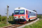 5047 095 passiert am 24.09.2010 als R7789 nach Neckenmarkt-Horitschon das Eisenbahnkreuzungsüberwachungssignal der Bundesstraße 62.