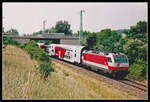 1014 014 ist am 9.07.2003 mit E2818 bei Baumgarten unterwegs. Der Zuglauf des E2818 war folgender : Sopron - Ebenfurth (stürzen) - Achau - Wien Meidling - Wien Süd. Die Gysevstrecke ist mit 25KV 50Hz ,die ÖBB - Strecke mit 15KV 16 2/3Hz elektrifiziert. Für die Baureihe 1014 waren solche Züge das ideale Einsatzgebiet da damit ihre Zweifrequenzfähigkeit voll genutzt wurde.
