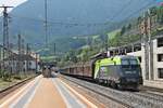 Nachschuss auf 1016 036  CAT , als diese am Morgen des 03.07.2018 einen langen und schweren Papierzug aus Schweden, welcher von 1016 026 und 1116 269 bespannt war, durch den Bahnhof von Matrei am