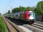 Die Portugal Lok 1016 025 ist am 9.5.2008 mit einem EC bei Vaterstetten (bei Mnchen) unterwegs.