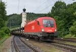 1016 045 mit einem Autozug am 14.07.2012 bei der Durchfahrt in Wernstein am Inn.