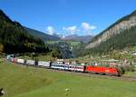 1016 038 mit einer Rola von Brennersee nach Wrgl Terminal am 09.10.2010 unterwegs bei St. Jodok am Brenner.