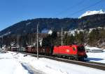 1016 004 mit einem Stahlzug am 21.02.2012 bei Terfens.