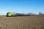 1016 016  CAT City Airport Train  brachte am 15.02.2021 einen Kesselwagenganzzug von Krems/Donau nach Linz. Die Aufnahme entstand zwischen Tulln Stadt und Tullnerfeld.