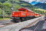 1020 018-6 steht mit einem Sonderzug aus Lienz, im Bahnhof Abfaltersbach.