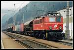 1040 004 mit Güterzug in Wartberg im Mürztal am 27.02.1998.