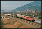 1042 033 mit Güterzug kurz vor Bruck an der Mur am 18.03.2003.