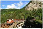 1042.033 mit dem OIC559 (Wien - Graz). Breitenstein/Kalte-Rinne-Viadukt, 5.9.2009.