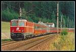 1044 069 fährt am 4.08.1994 mit EC31 (Wien Süd - Rom) bei Leoben Hinterberg durchs Murtal.