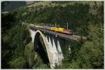 Eine Lok der Baureihe 1044 schiebt eine Rola ber die Tauern Sdrampe. Pfaffenberg-Zwenberg Brcke Penk 2.8.2010