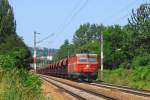 44er-Thementag: 1044 095 hatte am 22.06.2006 eine Sonderladung Schotter fr den Bahnhofsumbau Inzersdorf (Ort) am Haken und wurde zwischen Htteldorf und Maxing aufgenommen.