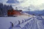 1044 007 rollt bei Fieberbrunn Richtung Wörgl, 21.12.1986, E640.