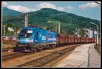 1116 100 fährt am 8.07.2003 mit einem Güterzug durch Bruck/Mur.