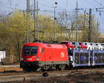 1116 193 von ÖBB kommt aus Richtung Köln,Aachen-Hbf,Aachen-Schanz  mit einem Jaguar-Autozug aus Graz-Vbf(A) nach Zeebrugge(B) und fährt in Aachen-West ein.