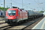 Kesselzug mit 1116 097-5 (Siemens ES64U2) ÖBB ist im Bahnhof Bietigheim-Bissingen abgestellt.