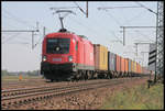 ÖBB Taurus 1116.259 verlässt hier am 12.9.2006 bei Dedensen mit einem Containerzug Seelze in Richtung Wunsdorf.