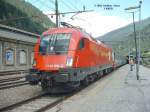 EC 85 München - Rom mit ÖBB-Lok 1116 066-0 und italienischen Wagen ist am 29.08.2004 pünktlich um 12:02 im Bahnhof Brenner eingefahren.