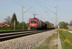 1116-249-2 mit Güterwaggons Richtung Rosenheim, aufgenommen am 27.04.2012 bei Übersee