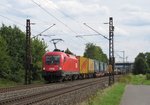 1116 199 von der ÖBB zieht am 11.August 2016 einen KLV-Zug bei Thüngersheim in Richtung Gemünden(Main).
