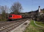 Die 1116 161 mit einem Kesselzug am 25.03.2017 bei der Durchfahrt in Wernstein.