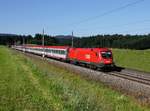 Die 1116 132 mit einem OIC am 16.06.2012 unterwegs bei Pöndorf.