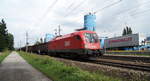 1116 184 mit einem Güterzug aus Wagen der slowenischen SŽ in Fahrtrichtung Salzburg bei Neumarkt-Köstendorf, 15.08.2018.