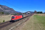 1116 198 mit einem Güterzug am 23.03.2019 bei Fürnitz.