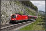 1116 125 mit Railjet bei Breitenstein am 18.05.2020.