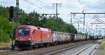 ÖBB - Österreichische Bundesbahnen [A] mit dem Taurus  1116 145  [NVR-Nummer: 91 81 1116 145-4 A-ÖBB] und Ganzzug offener Drehgestell-Güterwagen (leer) um Schrott im Hafen von