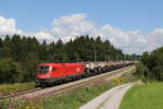 1116 138 mit einem Kesselwagenzug aus Salzburg kommend am 1.