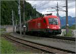 Der MARIA THERESIA kommt: 1116 245 fhrt mit dem OEC 160  MARIA THERESIA  von Wien West komment in den Bahnhof Kufstein ein.