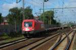 1116 236 vor einem Gterzug bei Hannover-Linden/Fischerhof