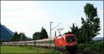 1116 230 schleppt den aus Elf Waggons bestehenden OEC 566  Stadt Innsbruck  von Wien Westbahnhof nach Bregenz.