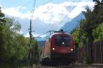 1116 079-3 eilt mit EC 84  Michelangelo  auf der Fahrt von Rimini nach Mnchen durch Vomp dem nchstem Halt, Jenbach, entgegen. 30.5.2009