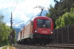 1116 139  Johann  und ein unbekannter Railjet-Taurus ziehen den OEC 663 von Feldkirch nach Wien durch Vomp dem nchsten Halt Salzburg entgegen. 30.5.2009