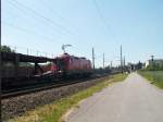 1116 132-0 mit leeren Autotransportwaggons von Linz kommend, Streckenteil Ansfelden-Nettingsdorf, Minolta Dimage Z3, 18.6.2005