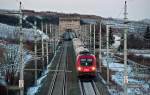 1116 243 am Intercity 537 kurz nach dem sogenannten Busserltunnel, unterwegs nach Villach Hbf. am Nachmittag des 02.02.2010, als die Sonne schon lange untergegangen war.Die Aufnahme entstand zwischen Gumpoldskirchen und Paffsttten in Niedersterreich.