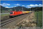 1116.184 mit Hackschnitzelgterzug 41360 bei Foirach am 01.04.2010