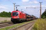 1116 145 fhrt mit einem Autoganzzug in Richtung Semmering. St.Egyden, 31.07.2010