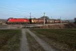 1116 002 mit dem Audizug Richtung Westen, am 25.03.2011 zwischen Bheimkirchen und Schildberg.