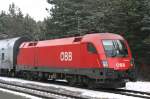 1116 136-1 mit einem Regionalzug von Wiener Neustadt nach Payerbach-Reichenau bei der Einfahrt in St.Egyden.