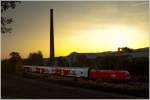 Bei Sonnenaufgang fhrt eine Lok der BR 1116 mit dem  R 2318 von Payerbach Reichenau nach Floridsdorf.Der Sonnenuntergang hat an diesem Tag dann so ausgesehen :O)