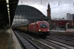 BB-Taurus 1116 144-5 mit einem Autotransportzug durch fhrt den Bremer Hbf.