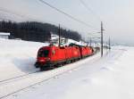 Die 1116 137 und die 1116 162 mit einem Gterzug am 11.02.2012 unterwegs bei Fieberbrunn.