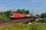 1116 149 mit einem Gterzug am 03.08.2012 bei der berquerung der Isar in Plattling.