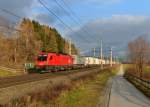 1116 066 mit einer Rola von Wrgl Terminal nach Brennersee am 01.12.2012 unterwegs bei Tefens.